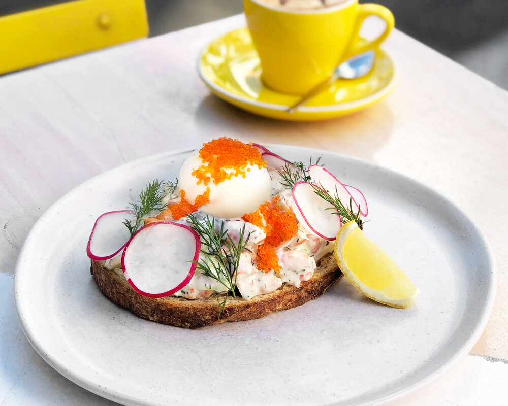 Fika-Swedish-Kitchen_Manly-Toast-Skagen_02 a slice of cake on a plate