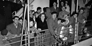 a group of people standing in front of a crowd