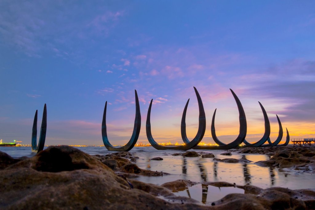 a sunset over a body of water