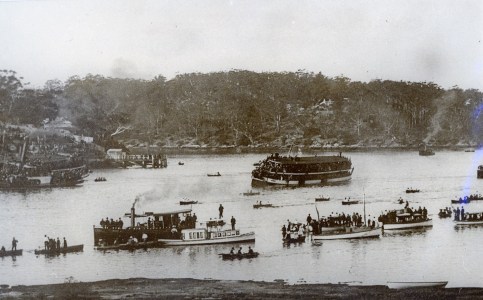 a group of people in a boat on a body of water