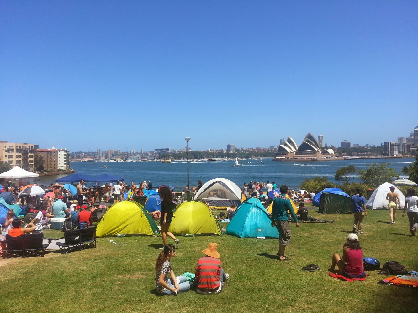 Picnic - a group of people sitting in a tent