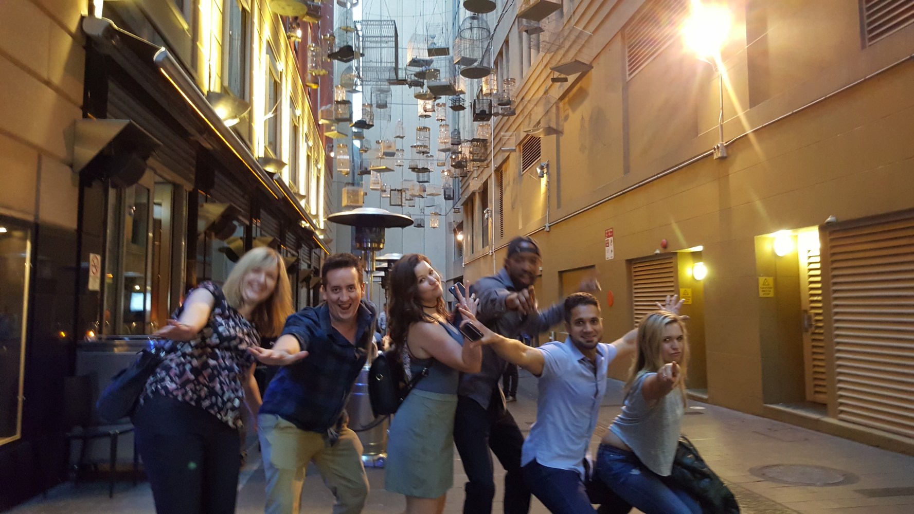 a group of people standing in front of a building