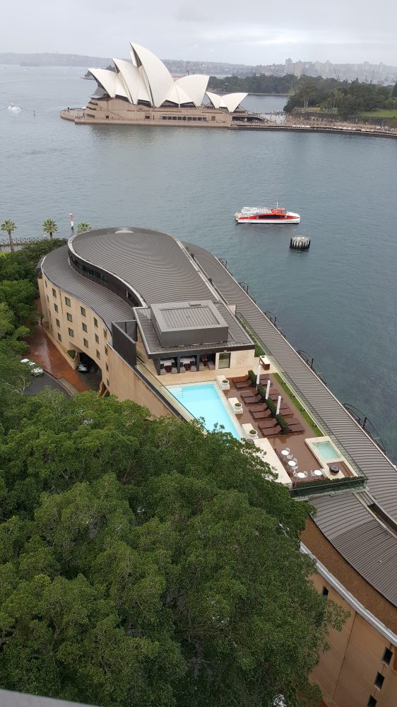 a boat is docked next to a body of water